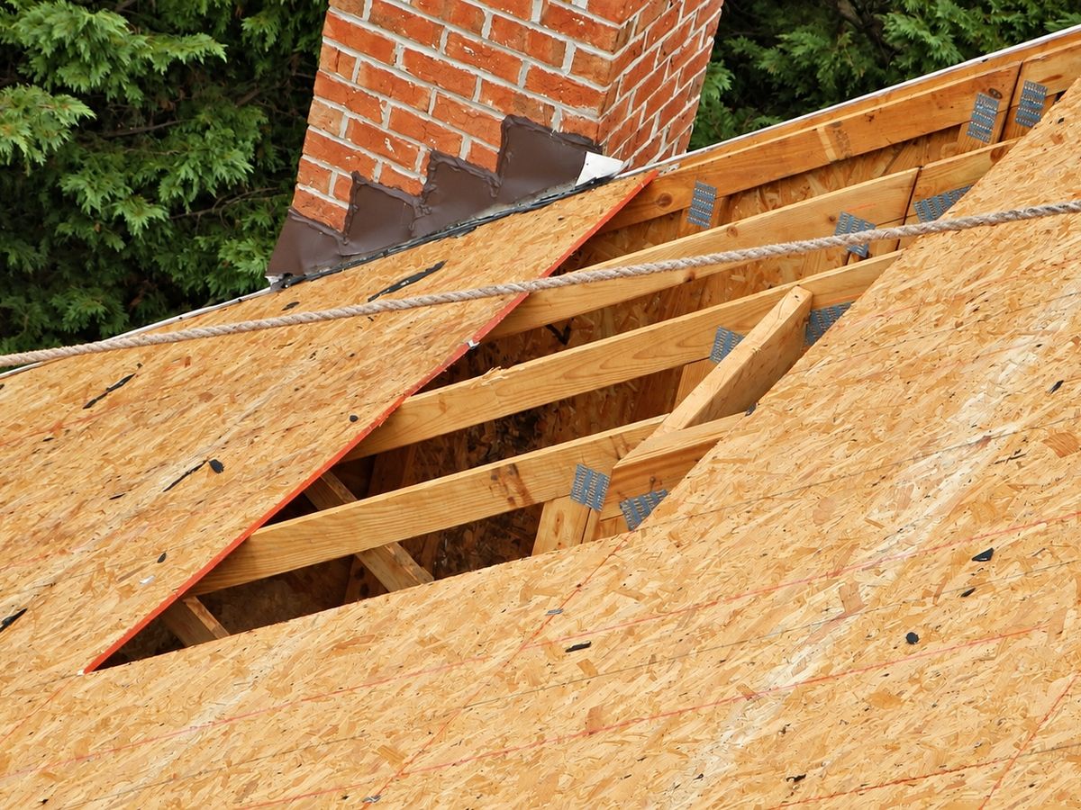 Overhead view of a roof deck with new OSB plywood sheets